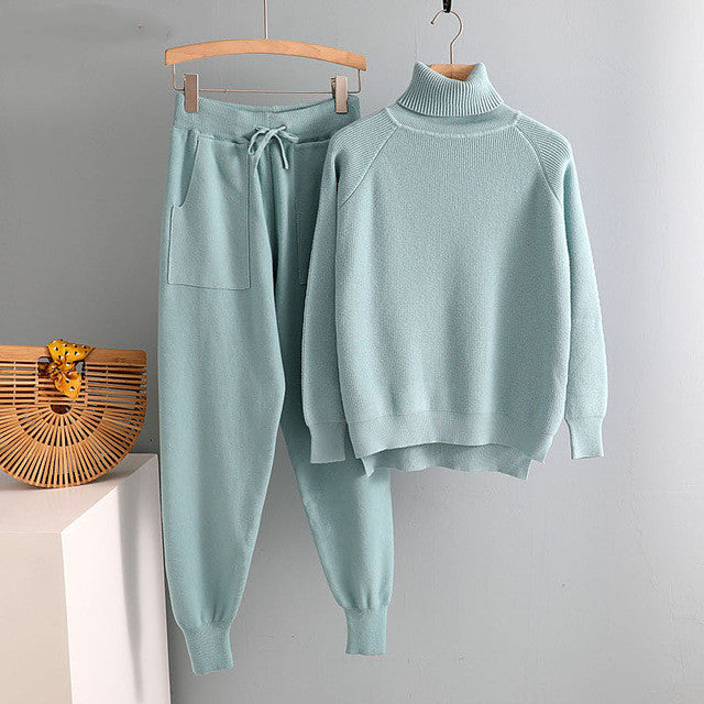 Light teal knitted turtleneck sweatshirt with matching drawstring jogger pants