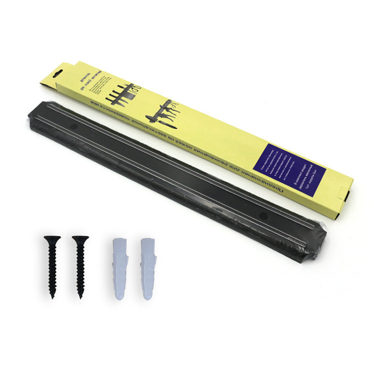 Black magnetic knife holder rail with two screws and two light-gray mounting spacers.