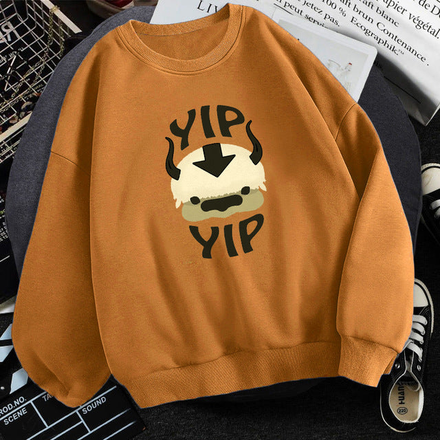 Brown fleece crewneck sweatshirt with centered character graphic print