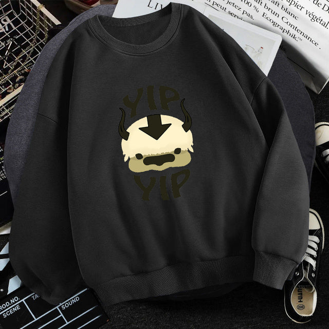 Black fleece crewneck sweatshirt with centered character graphic print