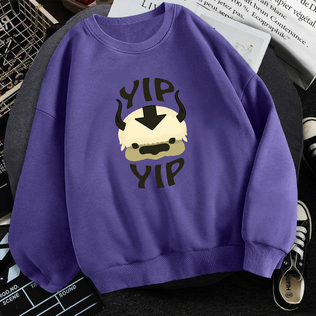 Purple fleece crewneck sweatshirt with centered character graphic print