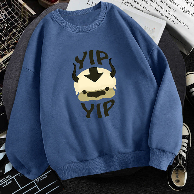 Blue fleece crewneck sweatshirt with centered character graphic print