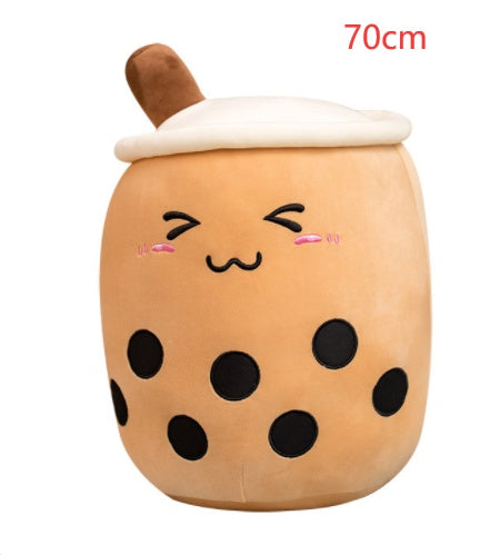 Brown plush boba tea cup pillow, white lid and brown straw, cute smiling face