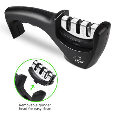 Black handheld knife sharpener with metal sharpening slots and removable grinder head inset