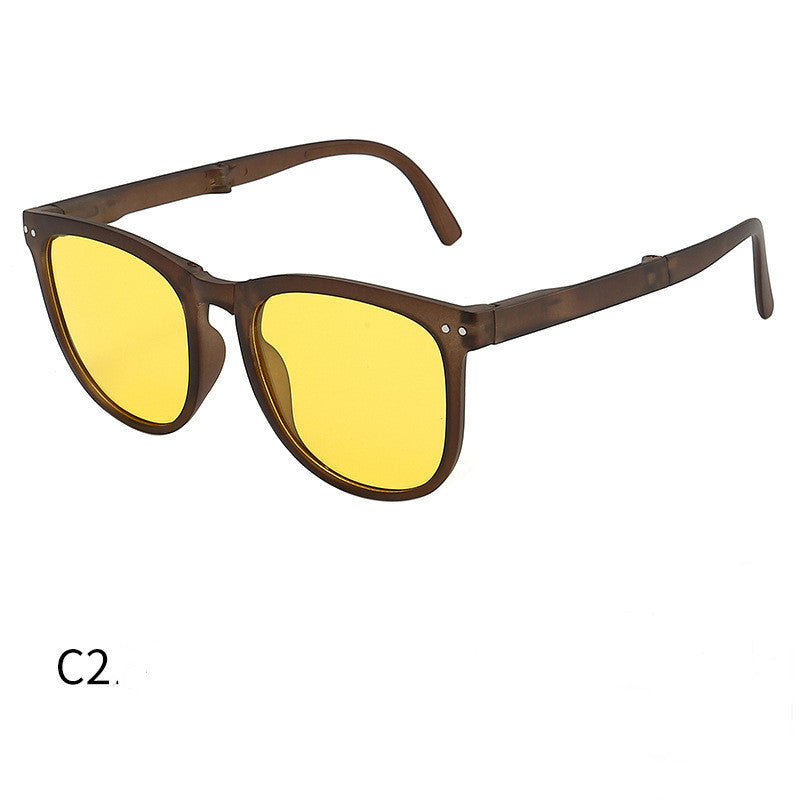 Foldable sunglasses with tortoiseshell frames and yellow-tinted lenses