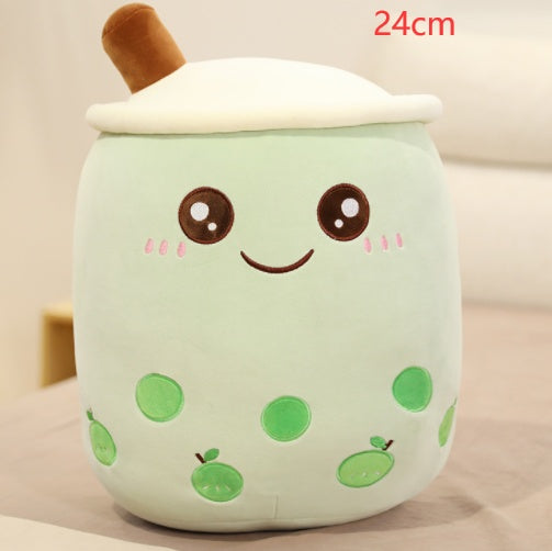 Mint green plush bubble tea cup pillow with brown straw, white top, cute face and green fruit dots