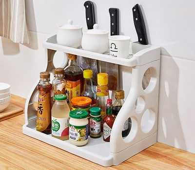 White kitchen storage rack with two tiers and cutout handle-style openings