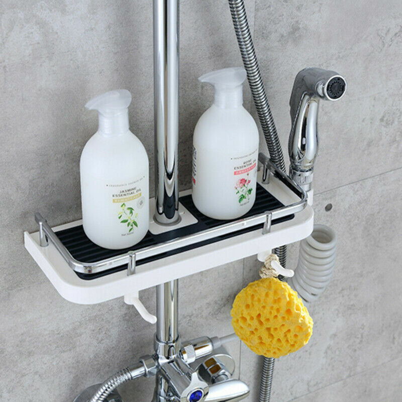 White shower caddy shelf with black tray holding bottles and loofah