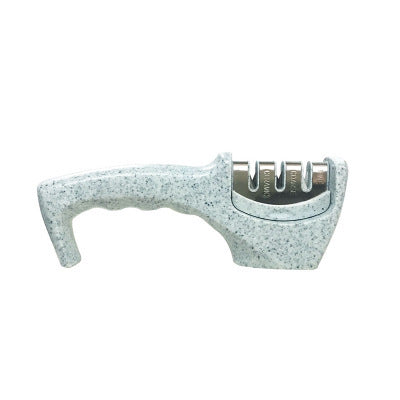 Speckled light gray sharpening insert with curved base and four metal blade slots