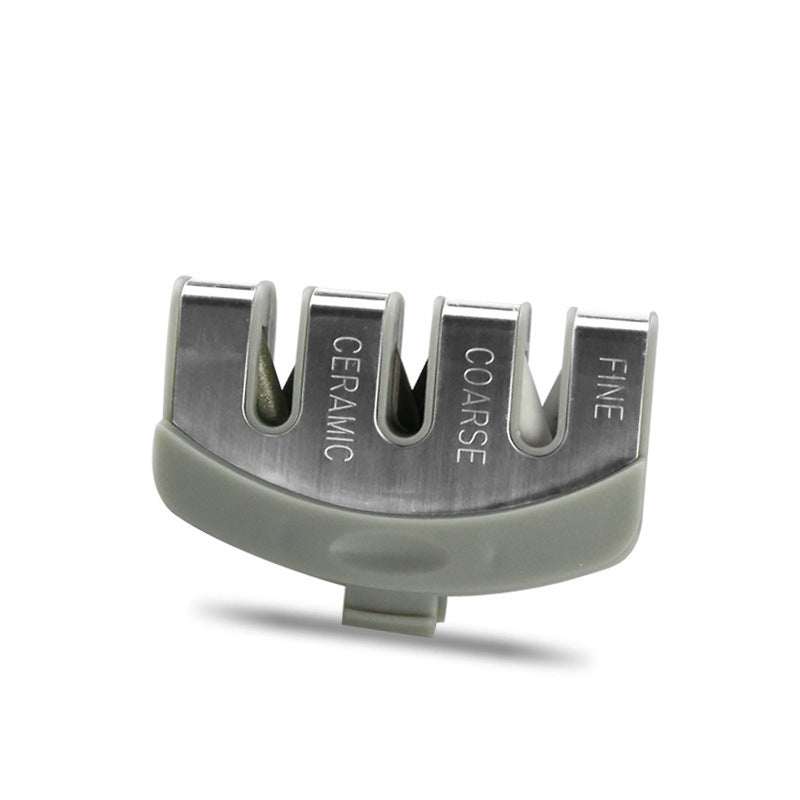 Gray multi-stage knife sharpener with four labeled metal sharpening slots on base