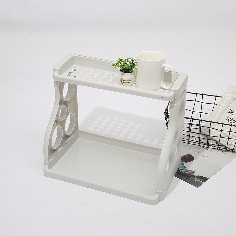 White kitchen storage rack with two tiers and a mug on the top shelf
