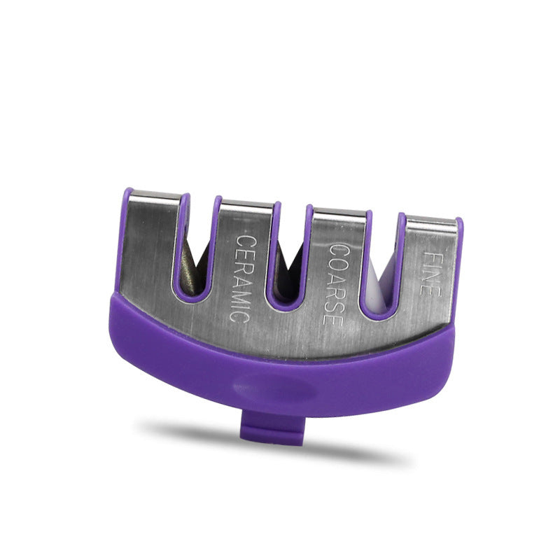 Purple multi-stage knife sharpener with four labeled metal slots and molded grip