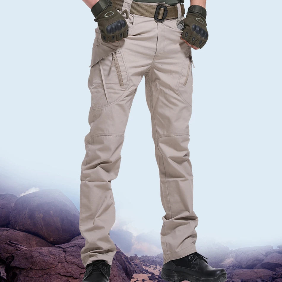 Men's multi-pocket pants in light khaki, featuring cargo pockets and belt loops