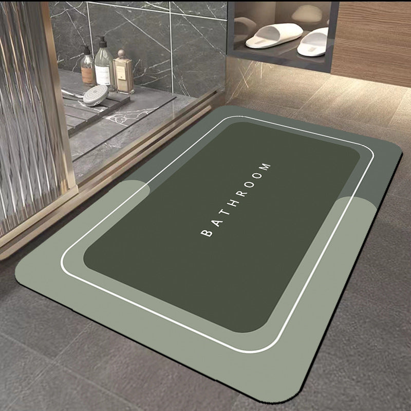Bathroom floor mat, square dark green center with light border and "BATHROOM" text