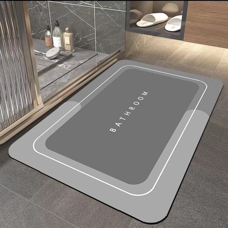 Quick-drying bathroom floor mat, dark gray top with white border outline and ���BATHROOM��� text