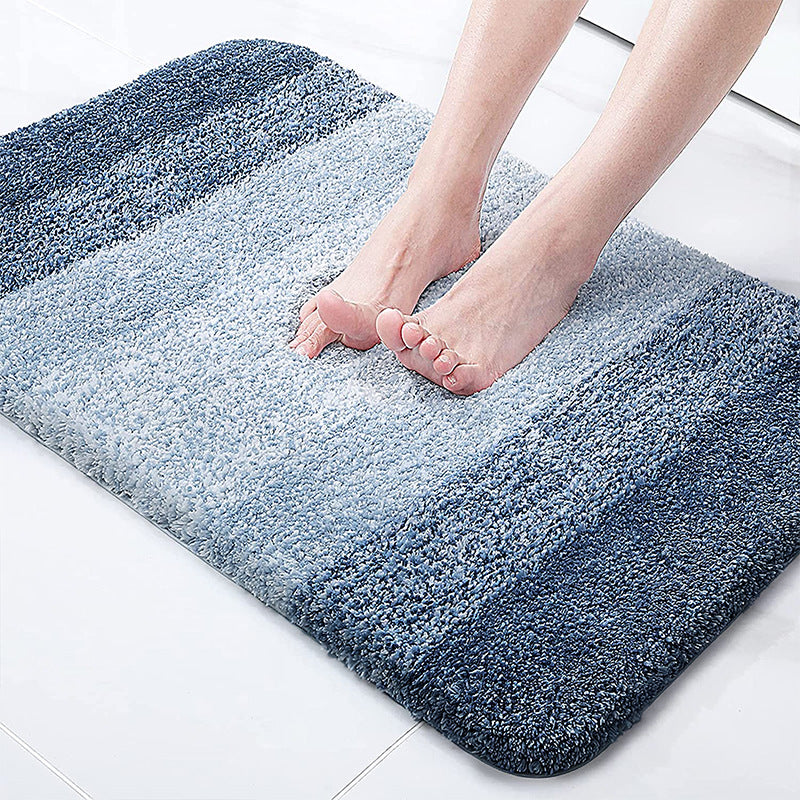 Navy-blue rectangular shag floor mat with thick absorbent loop pile
