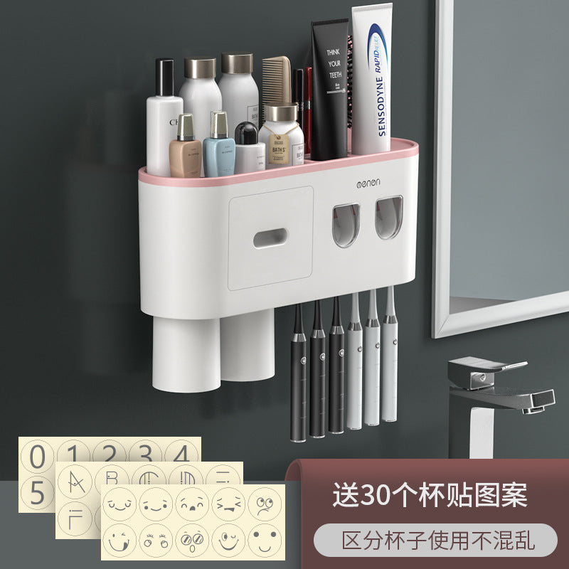 White toothbrush organizer with pink accent rail, brush slots, and two front drawer panels