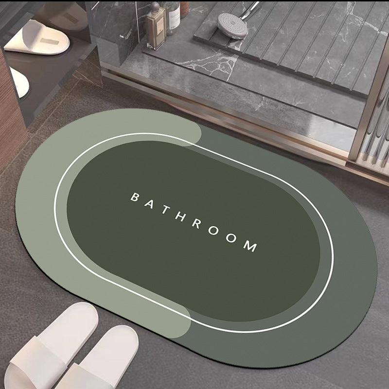 Quick-drying bathroom floor mat, green surface with white border outline and ���BATHROOM��� panel