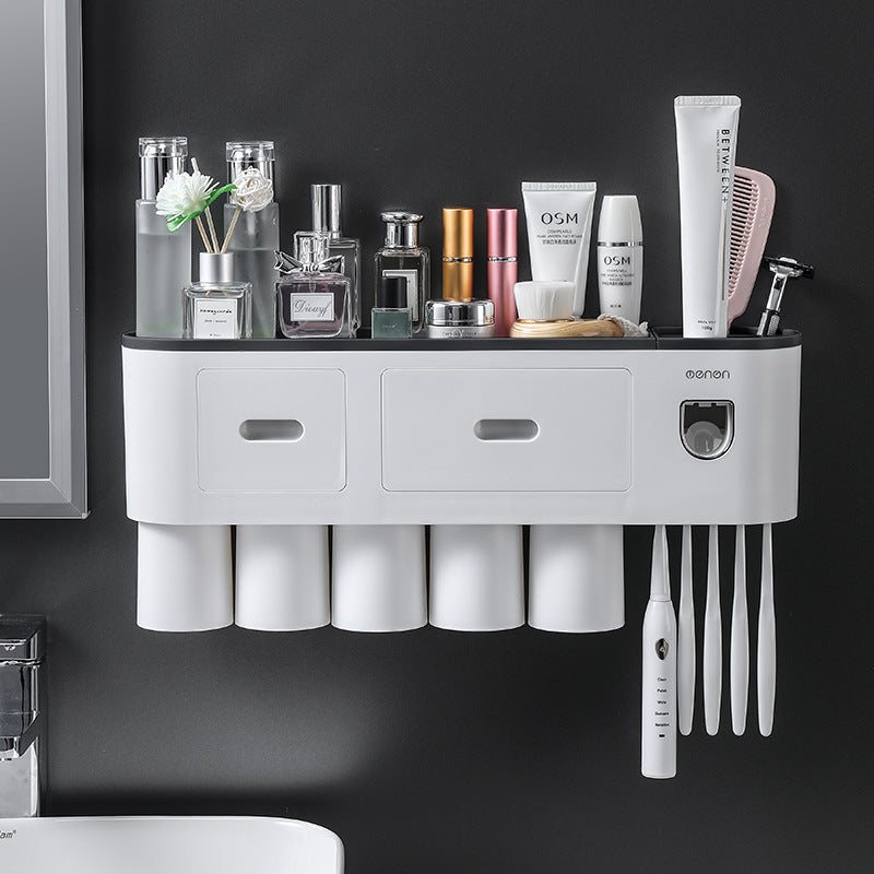 White wall-mounted toothbrush organizer with two drawers and cup slots plus brush holders.
