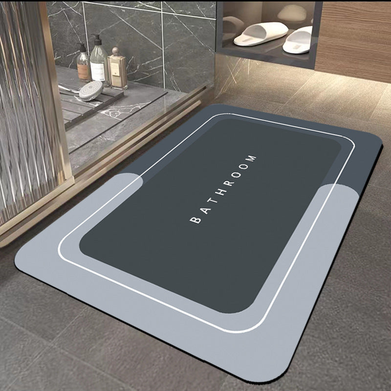Quick-drying bathroom floor mat, dark gray top with white border lines, front-facing view