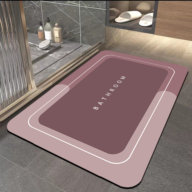 Quick-drying bathroom floor mat, mauve surface with white border outline, centered ���BATHROOM���