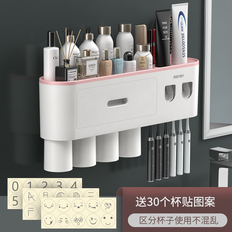 White wall-mounted toothbrush holder with pink accent top, drawer, cup slots, and right-side toothbrush slots.
