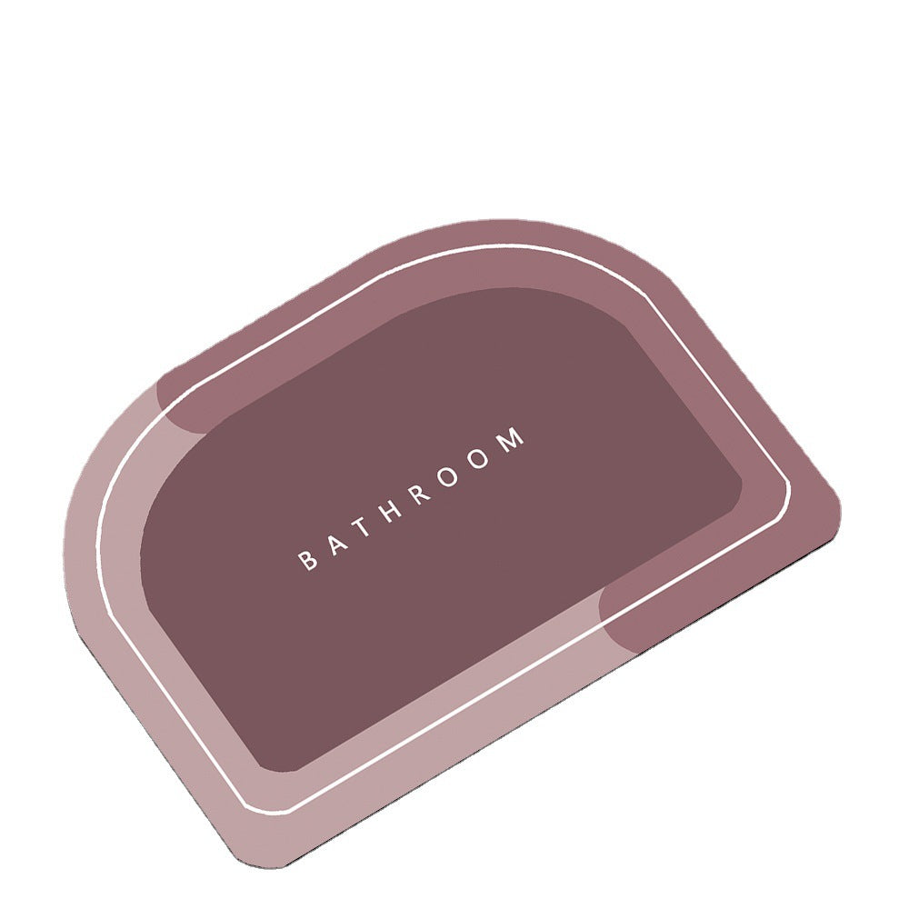 Quick-drying bathroom floor mat, mauve top with white outlined border, centered ���BATHROOM��� logo