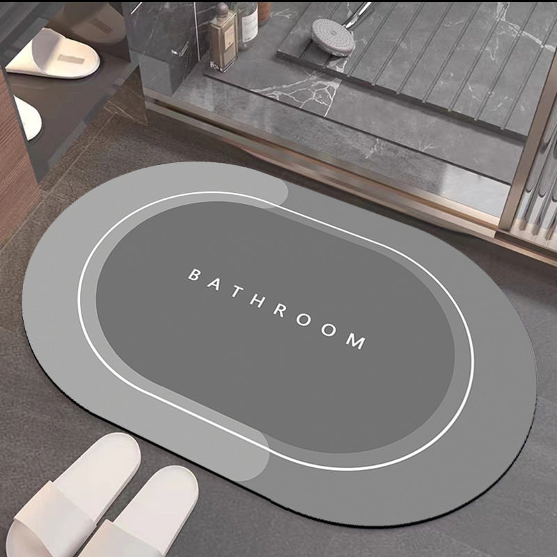 Quick-drying bathroom floor mat, medium gray with white outlined border and ���BATHROOM��� lettering