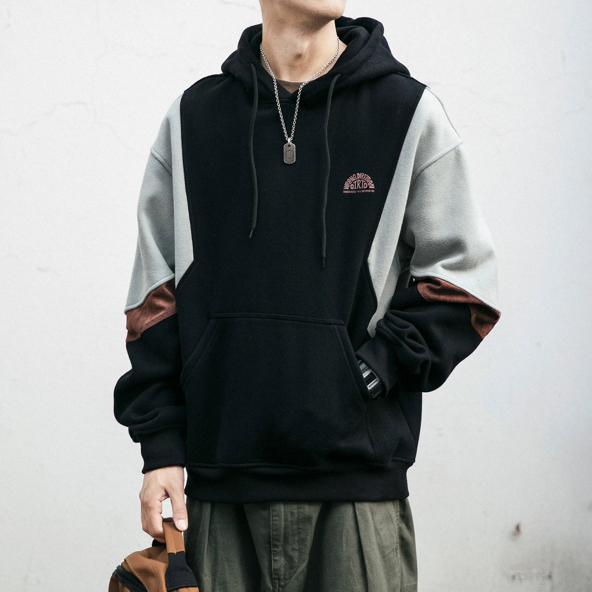 Men���s black and gray colorblock hoodie with drawstring hood and front kangaroo pocket