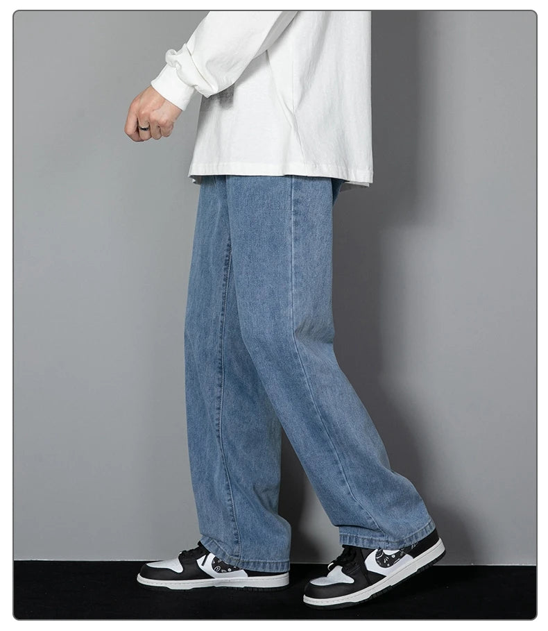 Mens wide-leg long jeans, light blue denim, roomy straight fit, flat front look