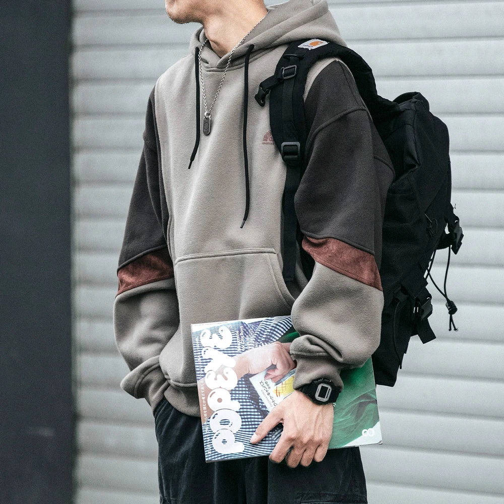 Men���s two-tone hoodie with front kangaroo pocket, zip-free hood, and ribbed cuffs