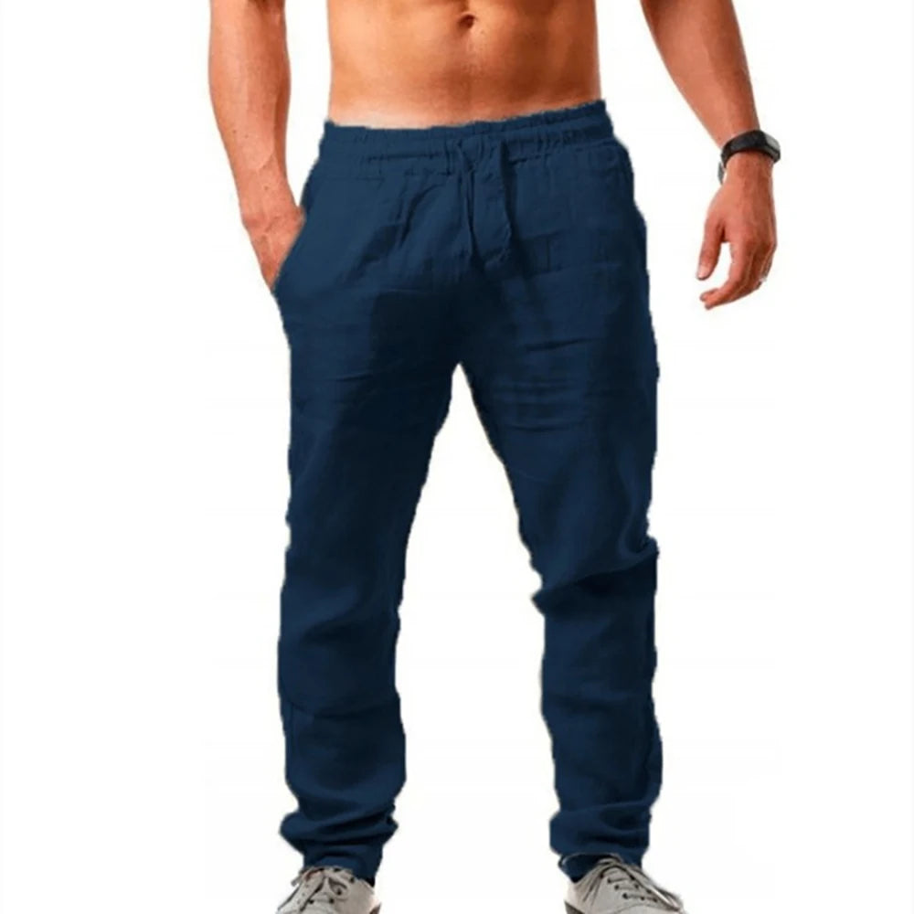 Navy cotton-linen long trousers with elastic waistband and tapered legs