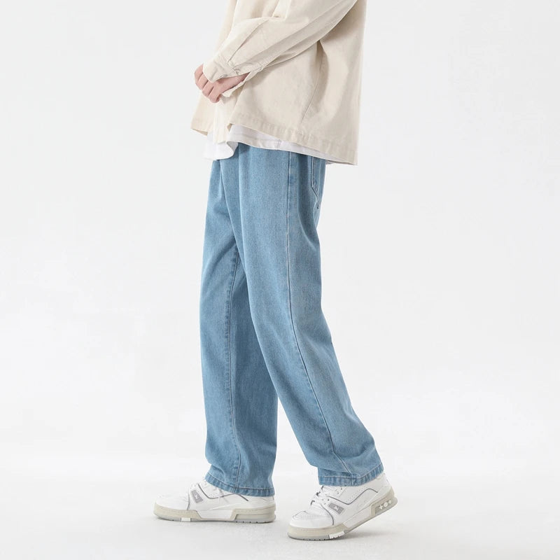 Light blue wide-leg ankle-length denim jeans with relaxed straight fit