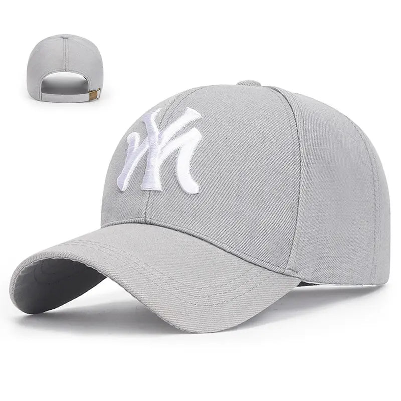 Grey baseball cap with curved brim and white NY logo patch on front