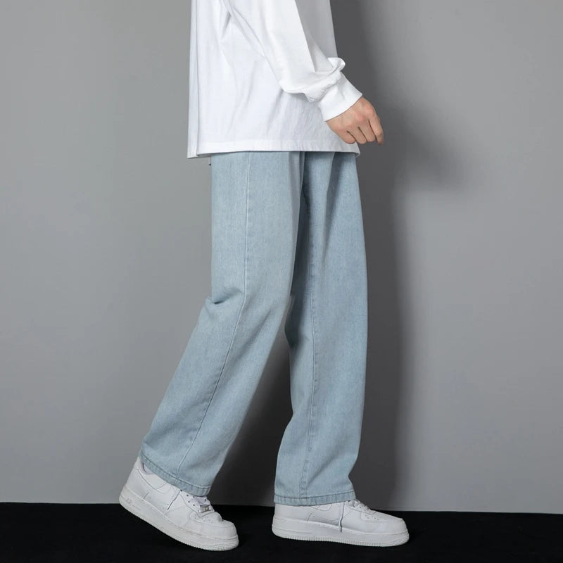 Light blue wide-leg denim jeans with relaxed fit and stitched front panel seams