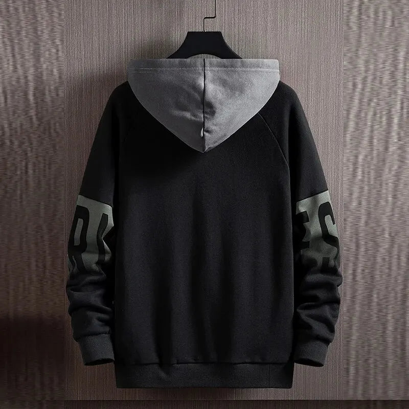 Black pullover hooded sweatshirt with gray hood lining and long sleeves