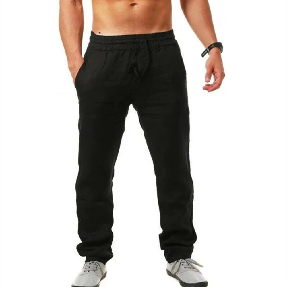 Black cotton-linen long trousers with elastic waistband and tapered legs