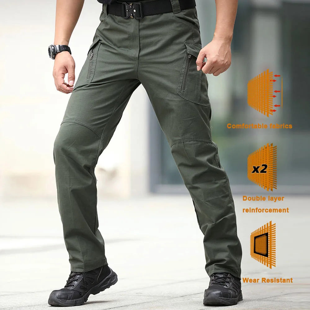 Olive green cargo hiking pants with multiple pockets and belt loops