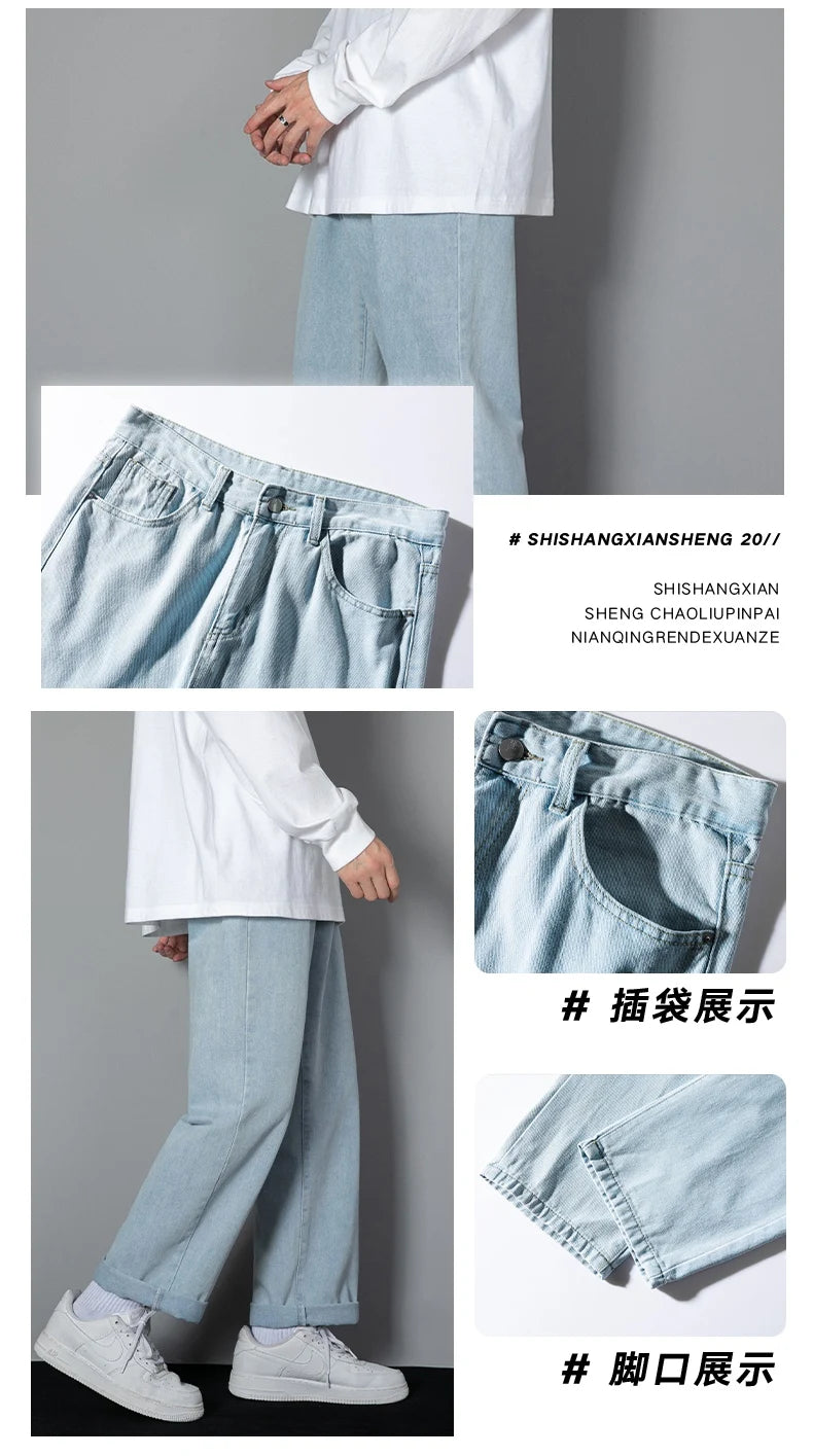 Light blue wide-leg denim jeans with elastic waistband detail and cuffed hem
