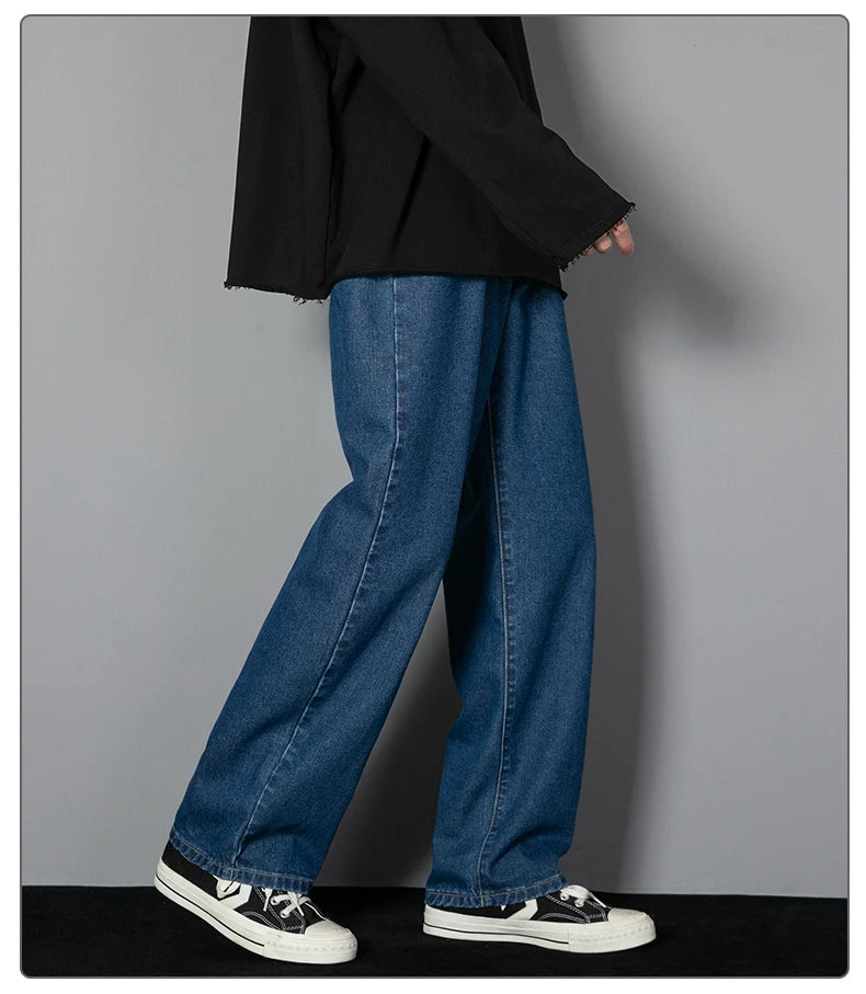 Mens wide-leg long jeans, medium blue denim, wide leg cut, long length