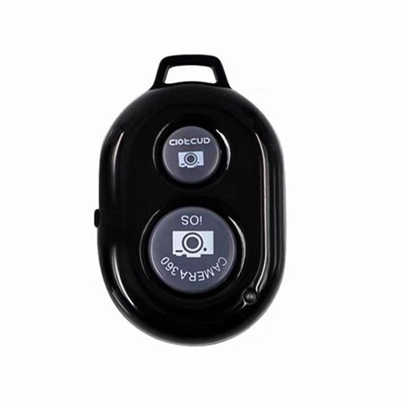 Black mini Bluetooth selfie shutter remote, camera icons on two circular pads