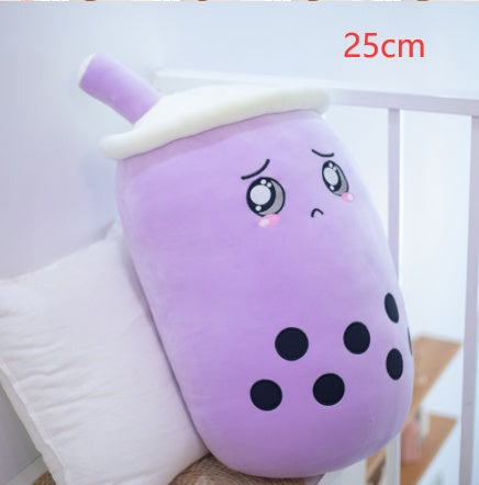Purple boba drink plush pillow with white lid and straw, sad face with black dot accents