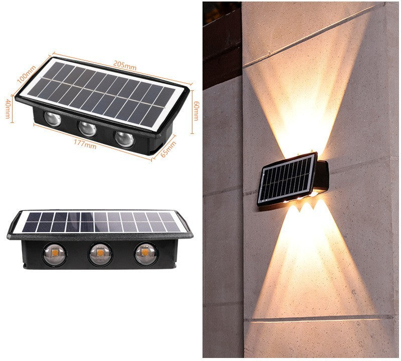 Solar wall light with rectangular solar panel and multi-LED warm yellow glow
