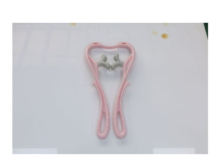 Pink swan neck body massager with roller head and curved handle loops