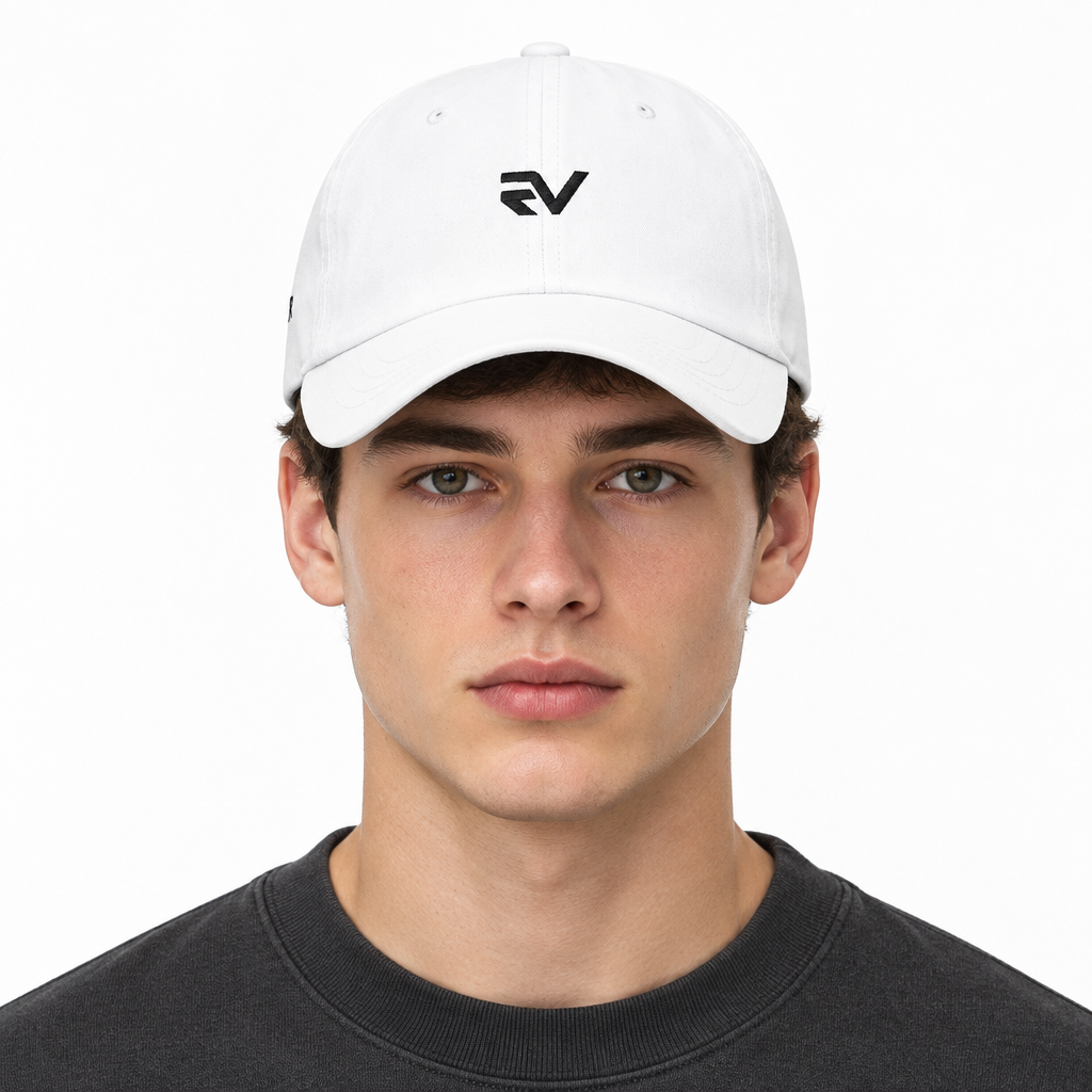 Front view of model wearing white REEVEAR cap