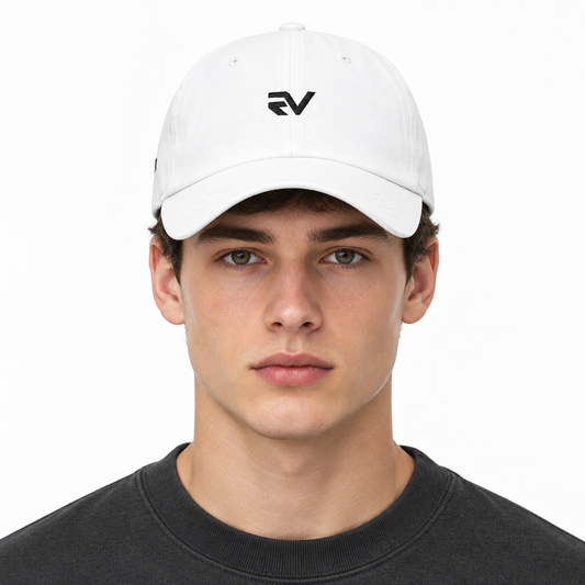 Front view of model wearing white REEVEAR cap
