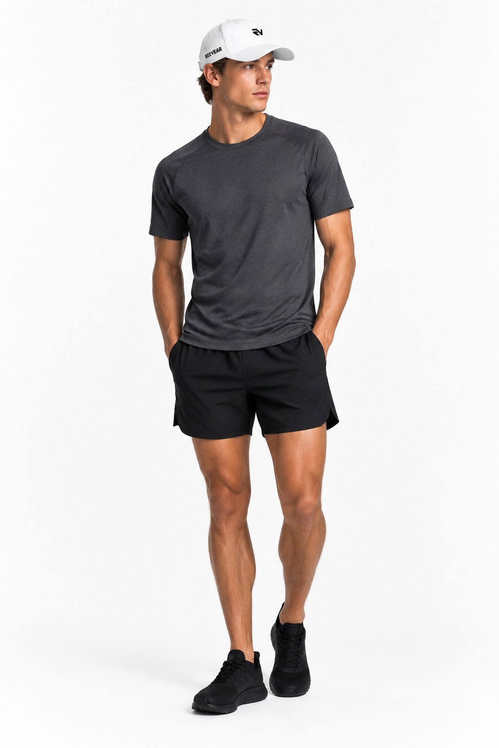 Full-body athletic model wearing the white REEVEAR cap