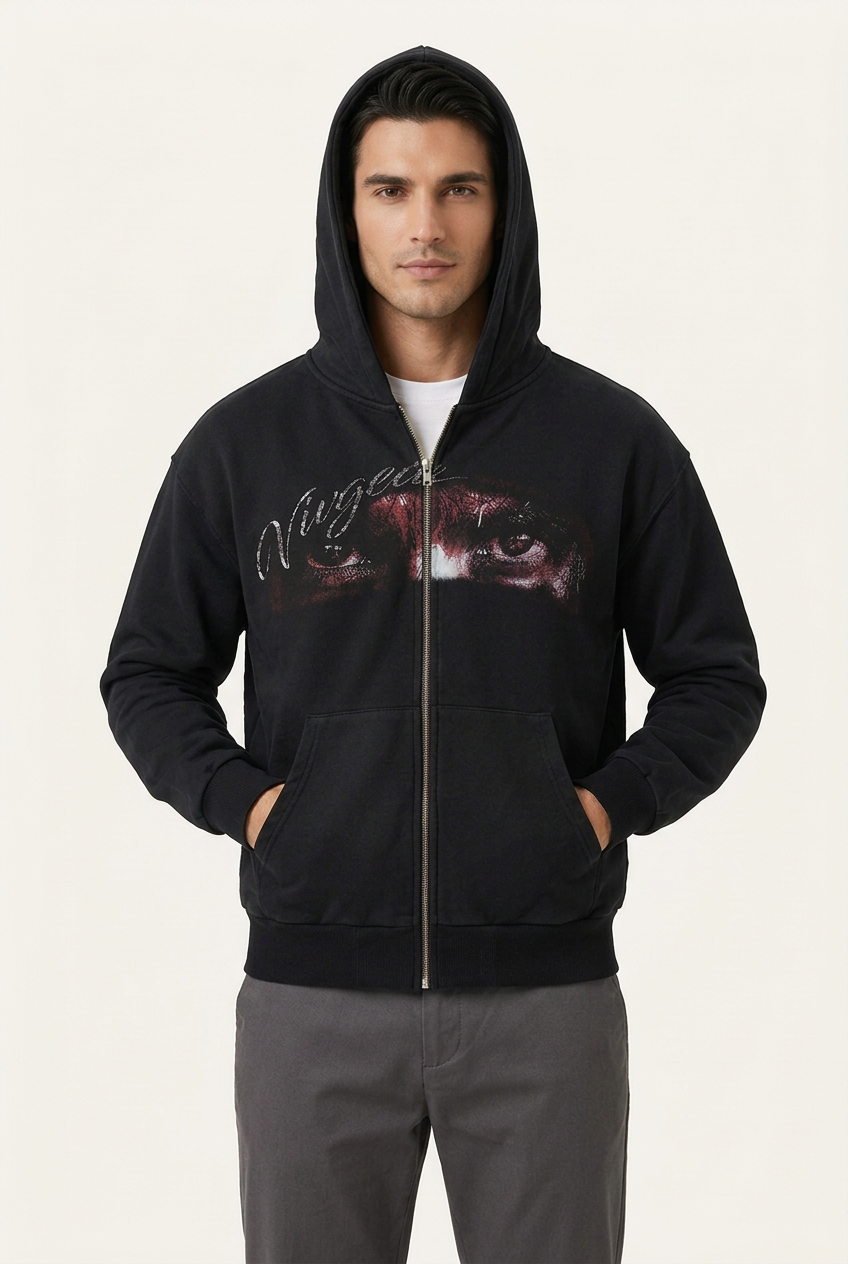 Model with hood up and hands in pockets