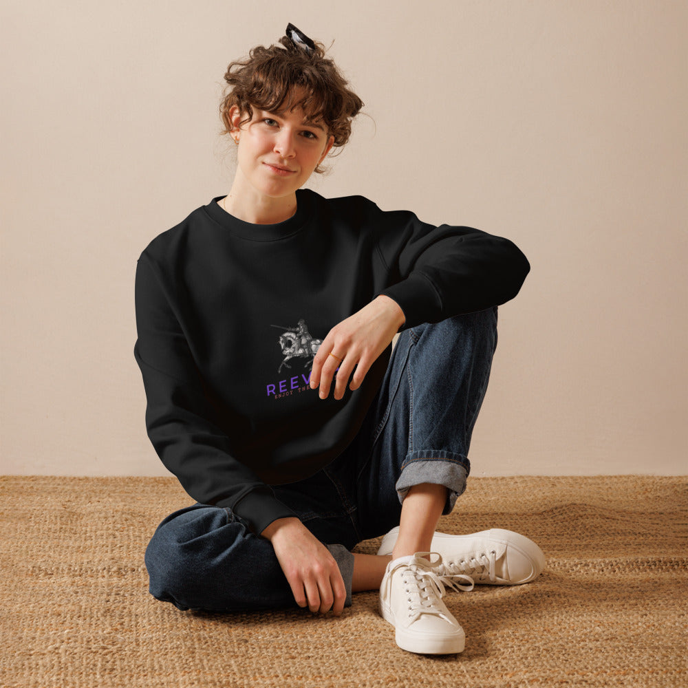 Black crewneck sweatshirt with front logo, worn with blue jeans and white sneakers